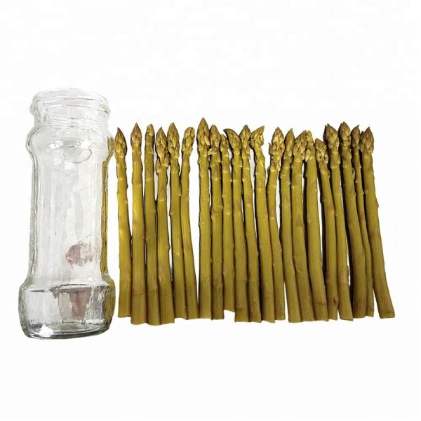 Green asparagus in glass jar
