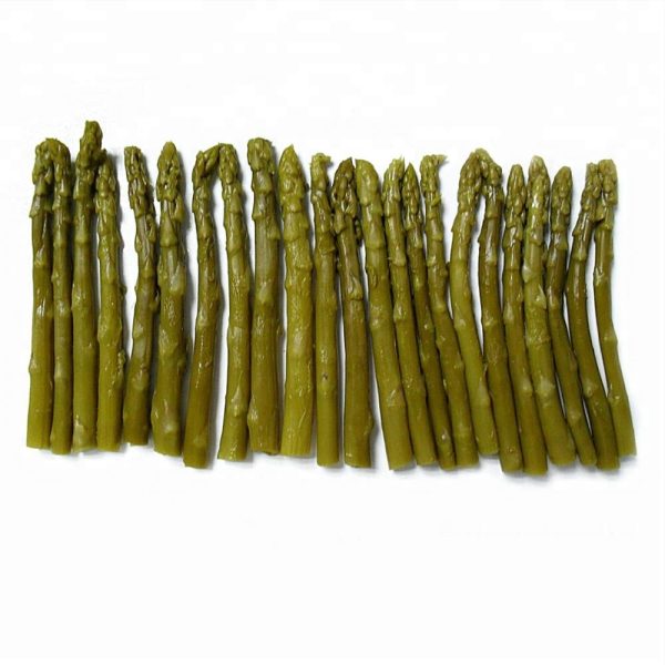 Green asparagus in glass jar